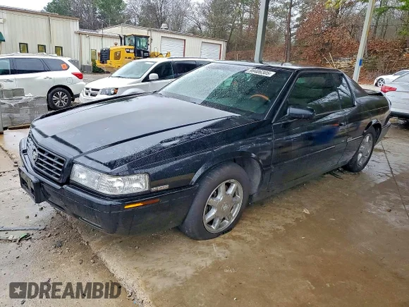 ✅ 2002 Cadillac Eldorado Touring • VIN: 1G6ET12992B105032 • Lot: 99406305. Wystawiony na Copart z przebiegiem 160 143 mil. Bezpłatny archiwum sprzedaży aukcyjnych z USA i szczegółowy raport historii pojazdu na DreamBid. Zdjęcie 1.