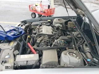 ✅ 1994 Buick Skylark Custom • VIN: 1G4NV55MXRC295891 • Lot: 41920129. Wystawiony na IAAI z przebiegiem 99 500 mil. Bezpłatny archiwum sprzedaży aukcyjnych z USA i szczegółowy raport historii pojazdu na DreamBid. Zdjęcie 13.