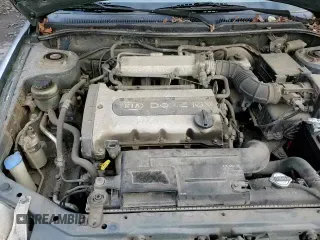 ✅ 2001 Kia Spectra GS • VIN: KNAFB161715035999 • Лот: 82587794. Опубликован ранее на Copart с пробегом 89 516 миль. Бесплатный доступ к архиву аукционных продаж из США и подробный отчёт об истории автомобиля на DreamBid. Изображение 13.