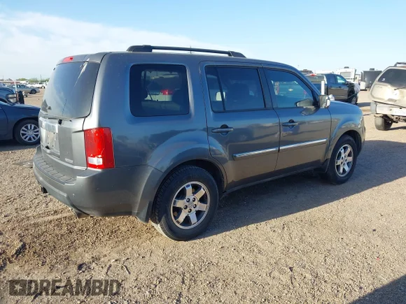 ✅ 2011 Honda Pilot Touring • VIN: 5FNYF3H94BB055075 • Lot: 44609643. Listed on IAAI with 165,754 mi. Free auction sales archive from the USA and detailed vehicle history report at DreamBid. Image 4.