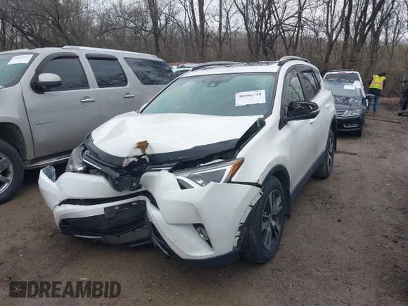 ✅ 2017 Toyota RAV4 XLE • VIN: JTMRFREV0HJ711802 • Лот: 40986748. Опубликован ранее на IAAI с пробегом 220 790 миль. Бесплатный доступ к архиву аукционных продаж из США и подробный отчёт об истории автомобиля на DreamBid. Изображение 2.