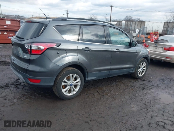 ✅ 2017 Ford Escape SE • VIN: 1FMCU0GD9HUC01972 • Lot: 44109608. Wystawiony na IAAI z przebiegiem 103 469 mil. Bezpłatny archiwum sprzedaży aukcyjnych z USA i szczegółowy raport historii pojazdu na DreamBid. Zdjęcie 4.
