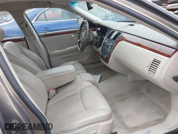 ✅ 2006 Cadillac DTS 1SC • VIN: 1G6KD57Y36U243327 • Lot: 41477885. Listed on IAAI with 95,893 mi. Free auction sales archive from the USA and detailed vehicle history report at DreamBid. Image 5.