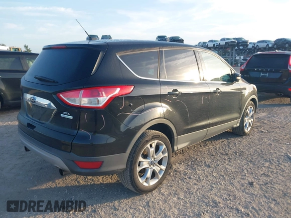 ✅ 2013 Ford Escape SEL • VIN: 1FMCU0H9XDUA34798 • Lot: 44854336. Wystawiony na IAAI z przebiegiem 151 180 mil. Bezpłatny archiwum sprzedaży aukcyjnych z USA i szczegółowy raport historii pojazdu na DreamBid. Zdjęcie 4.