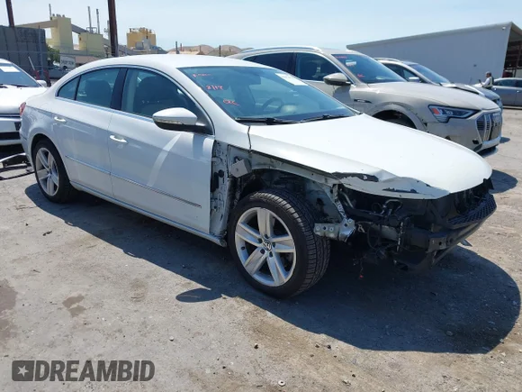 ✅ 2016 Volkswagen CC Sport • VIN: WVWBN7AN2GE501238 • Lot: 42952078. Wystawiony na IAAI z przebiegiem 127 707 mil. Bezpłatny archiwum sprzedaży aukcyjnych z USA i szczegółowy raport historii pojazdu na DreamBid. Zdjęcie 1.