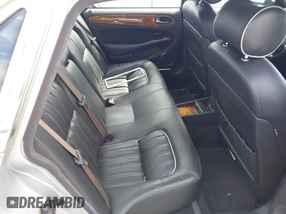 ✅ 2003 Jaguar XJ 8 • VIN: SAJDA14C63LF55776 • Lot: 44695334. Wystawiony na IAAI z przebiegiem 154 453 mil. Bezpłatny archiwum sprzedaży aukcyjnych z USA i szczegółowy raport historii pojazdu na DreamBid. Zdjęcie 8.