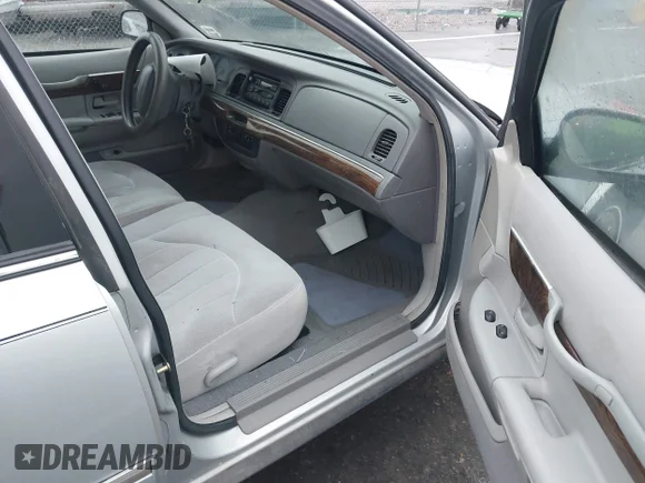 ✅ 1999 Mercury Grand Marquis GS • VIN: 2MEFM74WXXX685429 • Lot: 41163978. Wystawiony na IAAI z przebiegiem 146 671 mil. Bezpłatny archiwum sprzedaży aukcyjnych z USA i szczegółowy raport historii pojazdu na DreamBid. Zdjęcie 5.