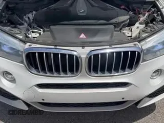 ✅ 2016 BMW X6 xDrive50i • VIN: 5UXKU6C52G0S82478 • Lot: 63113945. Listed on Copart with 123,916 mi. Free auction sales archive from the USA and detailed vehicle history report at DreamBid. Image 11.