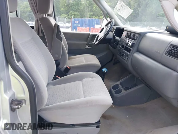 ✅ 2003 Volkswagen EuroVan MV • VIN: WV2NB470X3H005646 • Lot: 42614527. Wystawiony na IAAI z przebiegiem 173 788 mil. Bezpłatny archiwum sprzedaży aukcyjnych z USA i szczegółowy raport historii pojazdu na DreamBid. Zdjęcie 5.