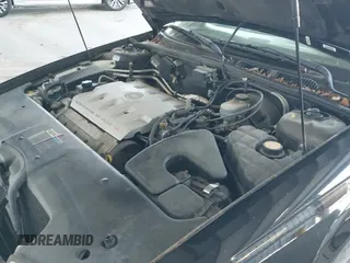 ✅ 2000 Cadillac Seville Touring STS • VIN: 1G6KY5490YU183902 • Lot: 43329551. Listed on IAAI with 68,903 mi. Free auction sales archive from the USA and detailed vehicle history report at DreamBid. Image 13.