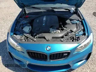 ✅ 2018 BMW M2 • VIN: WBS1J5C55JVD36118 • Лот: 71355455. Опубликован ранее на Copart с пробегом 72 919 миль. Бесплатный доступ к архиву аукционных продаж из США и подробный отчёт об истории автомобиля на DreamBid. Изображение 13.