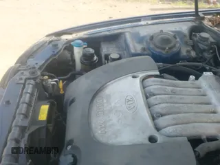 ✅ 2005 Kia Optima LX • VIN: KNAGD128255390165 • Лот: 42626972. Опубликован ранее на IAAI с пробегом 165 524 миль. Бесплатный доступ к архиву аукционных продаж из США и подробный отчёт об истории автомобиля на DreamBid. Изображение 13.