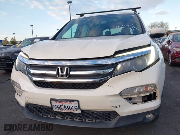 ✅ 2017 Honda Pilot EX-L • VIN: 5FNYF5H51HB006403 • Lot: 43857003. Wystawiony na IAAI z przebiegiem 101 437 mil. Bezpłatny archiwum sprzedaży aukcyjnych z USA i szczegółowy raport historii pojazdu na DreamBid. Zdjęcie 6.