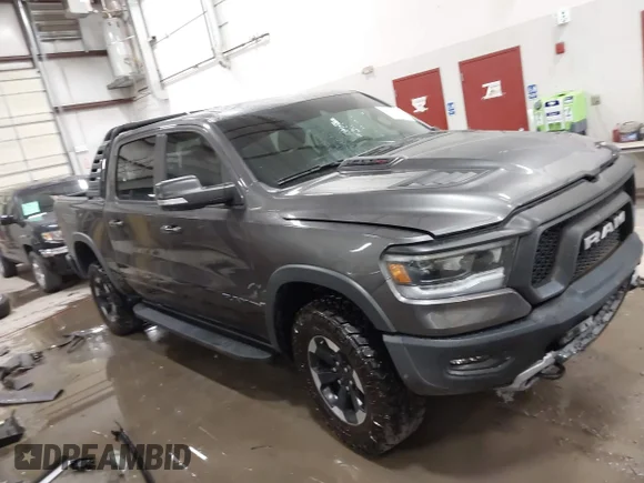 ✅ 2022 Ram 1500 Rebel • VIN: 1C6SRFLM0NN262554 • Лот: 43163352. Опубликован ранее на IAAI с пробегом 55 571 миль. Бесплатный доступ к архиву аукционных продаж из США и подробный отчёт об истории автомобиля на DreamBid. Изображение 1.