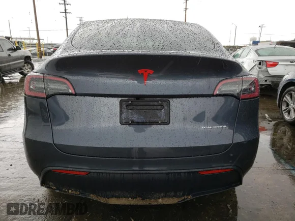 ✅ 2023 Tesla Model Y Long Range • VIN: 7SAYGDEE6PA037799 • Лот: 42608453. Опубликован ранее на Copart с пробегом 7 112 миль. Бесплатный доступ к архиву аукционных продаж из США и подробный отчёт об истории автомобиля на DreamBid. Изображение 6.