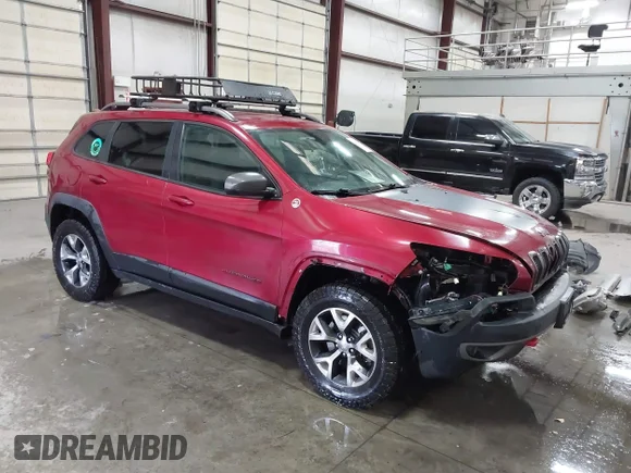 ✅ 2015 Jeep Cherokee Trailhawk • VIN: 1C4PJMBS2FW635261 • Lot: 43668169. Wystawiony na IAAI z przebiegiem 141 245 mil. Bezpłatny archiwum sprzedaży aukcyjnych z USA i szczegółowy raport historii pojazdu na DreamBid. Zdjęcie 1.