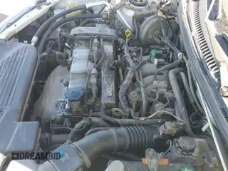 ✅ 2003 Mazda Protege DX • VIN: JM1BJ226031209806 • Лот: 42541169. Опубликован ранее на IAAI с пробегом 211 091 миль. Бесплатный доступ к архиву аукционных продаж из США и подробный отчёт об истории автомобиля на DreamBid. Изображение 12.