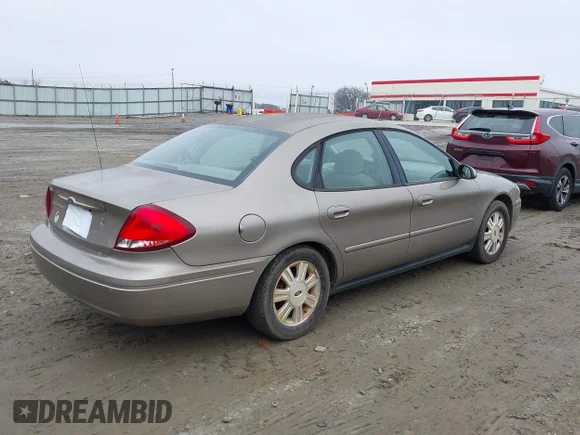 ✅ 2007 Ford Taurus SEL • VIN: 1FAFP56U97A144637 • Lot: 41107522. Listed on IAAI with 181,746 mi. Free auction sales archive from the USA and detailed vehicle history report at DreamBid. Image 4.