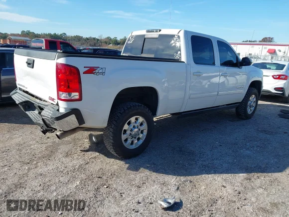 ✅ 2014 GMC Sierra 2500HD SLT • VIN: 1GT121EG1EF158961 • Lot: 44301021. Wystawiony na IAAI z przebiegiem 286 106 mil. Bezpłatny archiwum sprzedaży aukcyjnych z USA i szczegółowy raport historii pojazdu na DreamBid. Zdjęcie 4.