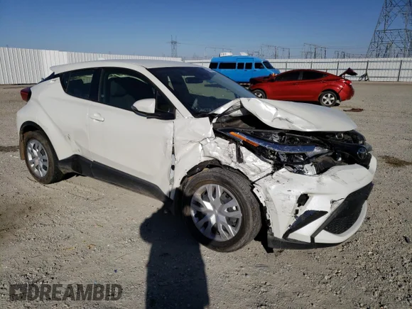 ✅ 2021 Toyota C-HR LE • VIN: JTNKHMBX9M1122869 • Lot: 69394102. Wystawiony na Copart z przebiegiem 18 463 mil. Bezpłatny archiwum sprzedaży aukcyjnych z USA i szczegółowy raport historii pojazdu na DreamBid. Zdjęcie 4.
