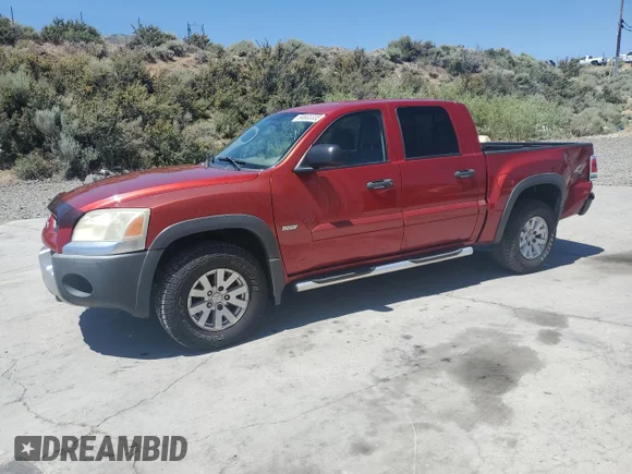 ✅ 2006 Mitsubishi Raider • VIN: 1Z7HT38K36S538243 • Lot: 60665335. Listed on Copart with 184,772 mi. Free auction sales archive from the USA and detailed vehicle history report at DreamBid. Image 1.