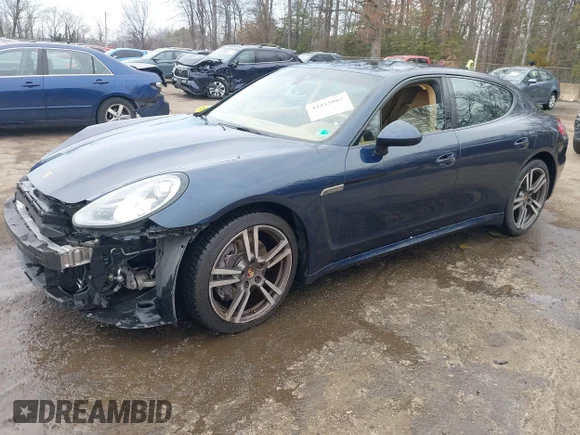 ✅ 2014 Porsche Panamera • VIN: WP0AA2A75EL008965 • Лот: 44412882. Опубліковано раніше на IAAI з пробігом 97 377 миль. Безкоштовний доступ до архіву аукціонних продажів зі США та докладний звіт про історію автомобіля на DreamBid. Зображення 2.