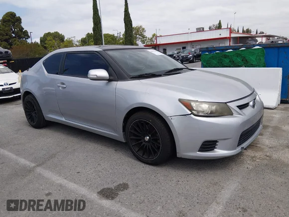 ✅ 2011 Scion tC • VIN: JTKJF5C71B3009454 • Лот: 45072348. Опубликован ранее на IAAI с пробегом 152 719 миль. Бесплатный доступ к архиву аукционных продаж из США и подробный отчёт об истории автомобиля на DreamBid. Изображение 1.