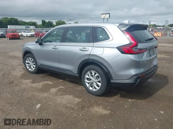 ✅ 2023 Honda CR-V LX • VIN: 7FARS3H2XPE012844 • Lot: 45418749. Wystawiony na IAAI z przebiegiem 86 988 mil. Bezpłatny archiwum sprzedaży aukcyjnych z USA i szczegółowy raport historii pojazdu na DreamBid. Zdjęcie 3.