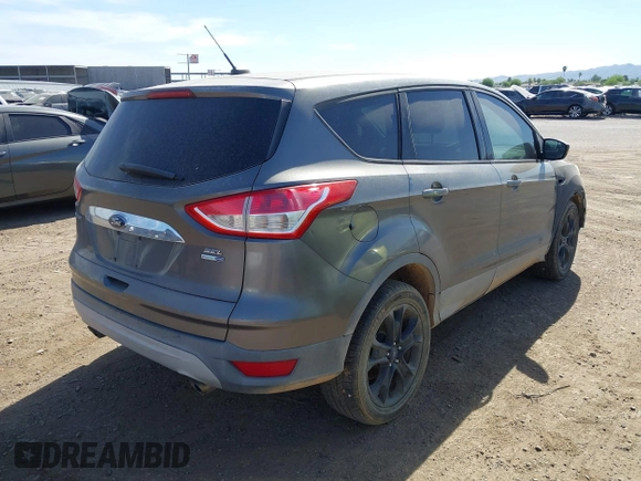✅ 2013 Ford Escape SEL • VIN: 1FMCU9H9XDUD80189 • Lot: 44761240. Wystawiony na IAAI z przebiegiem 84 098 mil. Bezpłatny archiwum sprzedaży aukcyjnych z USA i szczegółowy raport historii pojazdu na DreamBid. Zdjęcie 4.