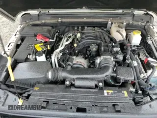 ✅ 2022 Jeep Gladiator Willys Sport • VIN: 1C6HJTAG8NL167359 • Лот: 51088715. Опубликован ранее на Copart с пробегом 28 454 миль. Бесплатный доступ к архиву аукционных продаж из США и подробный отчёт об истории автомобиля на DreamBid. Изображение 17.