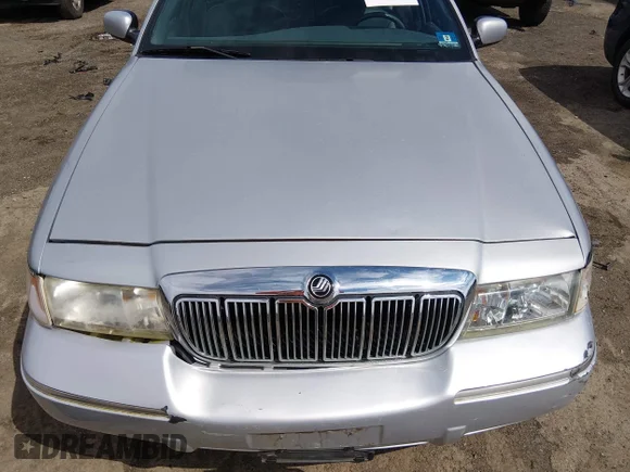 ✅ 1999 Mercury Grand Marquis LS • VIN: 2MEFM75W8XX663847 • Lot: 44708485. Wystawiony na IAAI z przebiegiem 128 382 mil. Bezpłatny archiwum sprzedaży aukcyjnych z USA i szczegółowy raport historii pojazdu na DreamBid. Zdjęcie 6.