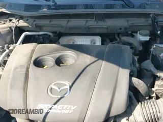 ✅ 2016 Mazda CX-5 Grand Touring • VIN: JM3KE2DY9G0735695 • Лот: 43184844. Опубликован ранее на IAAI с пробегом 160 616 миль. Бесплатный доступ к архиву аукционных продаж из США и подробный отчёт об истории автомобиля на DreamBid. Изображение 24.