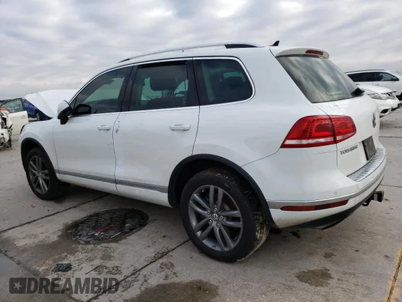 ✅ 2015 Volkswagen Touareg Sport • VIN: WVGEF9BP6FD002903 • Lot: 37999123. Wystawiony na Copart z przebiegiem Nie podano. Bezpłatny archiwum sprzedaży aukcyjnych z USA i szczegółowy raport historii pojazdu na DreamBid. Zdjęcie 2.