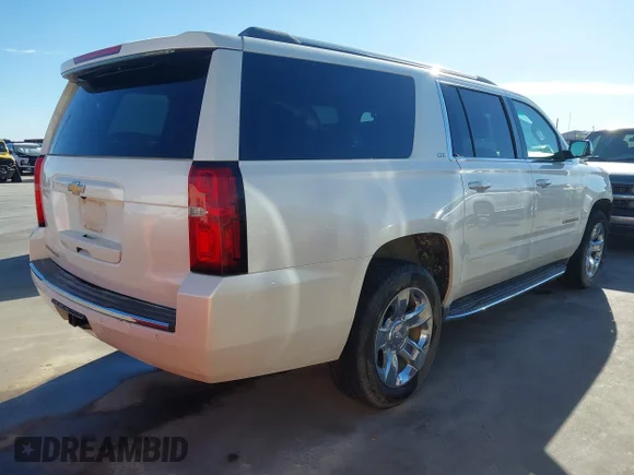 ✅ 2015 Chevrolet Suburban LTZ • VIN: 1GNSCKKC4FR610790 • Lot: 44167927. Listed on IAAI with 150,622 mi. Free auction sales archive from the USA and detailed vehicle history report at DreamBid. Image 4.