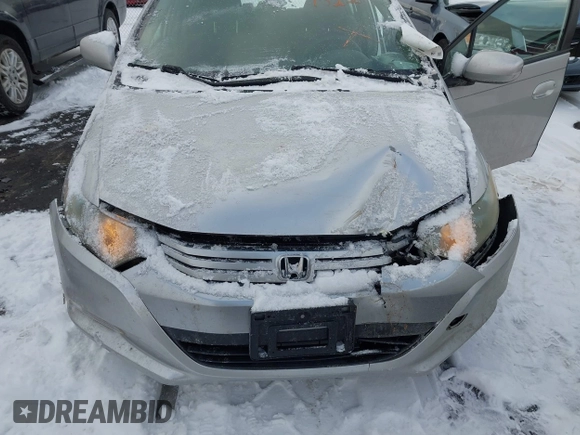 ✅ 2010 Honda Insight LX • VIN: JHMZE2H57AS002126 • Lot: 44057022. Listed on IAAI with 122,002 mi. Free auction sales archive from the USA and detailed vehicle history report at DreamBid. Image 6.
