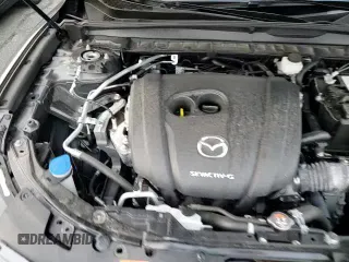 ✅ 2024 Mazda CX-50 S Preferred • VIN: 7MMVABBM1RN191281 • Lot: 82145985. Listed on Copart with 8,638 mi. Free auction sales archive from the USA and detailed vehicle history report at DreamBid. Image 14.