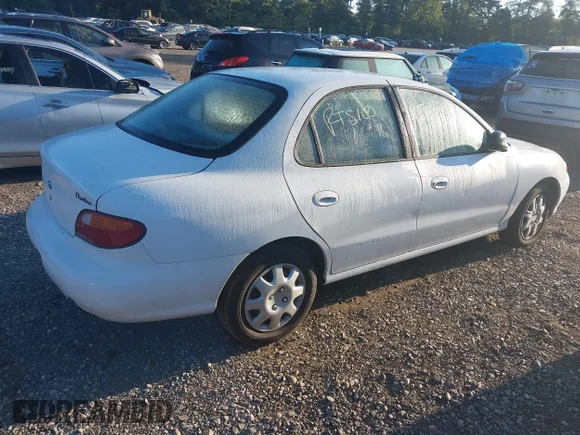 ✅ 1998 Hyundai Elantra • VIN: KMHJF24M2WU697065 • Lot: 43145955. Wystawiony na IAAI z przebiegiem Nie podano. Bezpłatny archiwum sprzedaży aukcyjnych z USA i szczegółowy raport historii pojazdu na DreamBid. Zdjęcie 4.