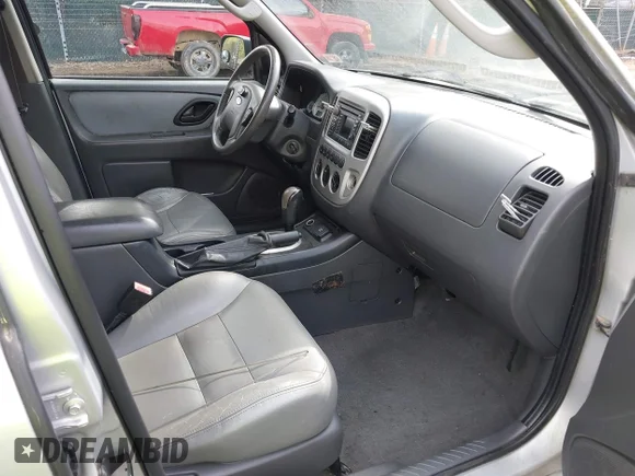 ✅ 2005 Ford Escape Hybrid • VIN: 1FMCU95H75KD90560 • Лот: 42048840. Опубліковано раніше на IAAI з пробігом 137 223 миль. Безкоштовний доступ до архіву аукціонних продажів зі США та докладний звіт про історію автомобіля на DreamBid. Зображення 5.