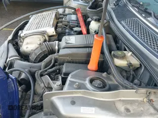 ✅ 2005 MINI Convertible S • VIN: WMWRH33465TF80604 • Lot: 43669901. Wystawiony na IAAI z przebiegiem 198 738 mil. Bezpłatny archiwum sprzedaży aukcyjnych z USA i szczegółowy raport historii pojazdu na DreamBid. Zdjęcie 12.