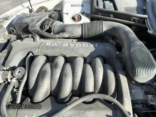 ✅ 2002 Jaguar XK • VIN: SAJDA42C02NA24466 • Lot: 93277815. Listed on Copart with 104,027 mi. Free auction sales archive from the USA and detailed vehicle history report at DreamBid. Image 11.