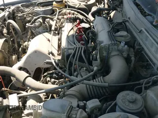 ✅ 1990 Toyota Camry DLX • VIN: 4T1SV21E6LU257382 • Lot: 41848382. Wystawiony na IAAI z przebiegiem 322 005 mil. Bezpłatny archiwum sprzedaży aukcyjnych z USA i szczegółowy raport historii pojazdu na DreamBid. Zdjęcie 12.