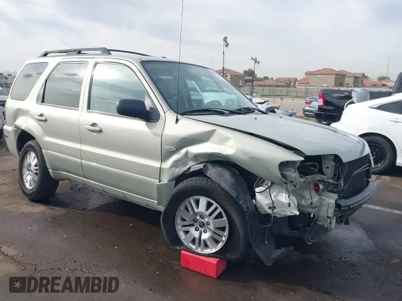 ✅ 2005 Mercury Mariner Luxury • VIN: 4M2YU56165DJ19511 • Лот: 44007639. Опубликован ранее на IAAI с пробегом 41 406 миль. Бесплатный доступ к архиву аукционных продаж из США и подробный отчёт об истории автомобиля на DreamBid. Изображение 1.