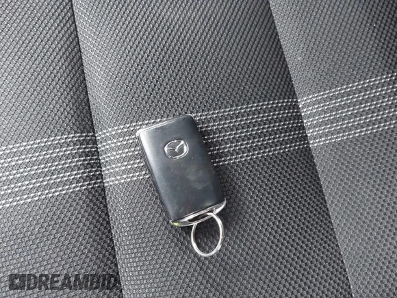 ✅ 2024 Mazda CX-50 S Premium • VIN: 7MMVABDM2RN196681 • Лот: 44350053. Опубліковано раніше на IAAI з пробігом 16 811 миль. Безкоштовний доступ до архіву аукціонних продажів зі США та докладний звіт про історію автомобіля на DreamBid. Зображення 11.