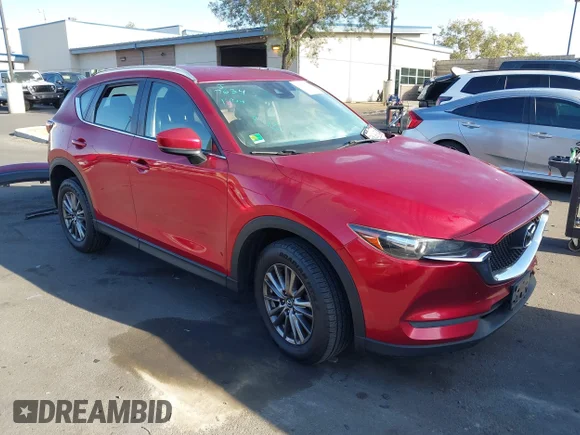 ✅ 2018 Mazda CX-5 Sport • VIN: JM3KFABMXJ0432987 • Lot: 45228527. Listed on IAAI with 172,979 mi. Free auction sales archive from the USA and detailed vehicle history report at DreamBid. Image 1.