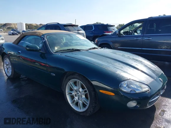 ✅ 2002 Jaguar XK • VIN: SAJDA42C32NA29323 • Лот: 43932658. Опубліковано раніше на IAAI з пробігом Не вказано. Безкоштовний доступ до архіву аукціонних продажів зі США та докладний звіт про історію автомобіля на DreamBid. Зображення 1.