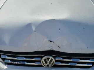 ✅ 2018 Volkswagen Tiguan SEL • VIN: 3VV3B7AX6JM214471 • Lot: 92935775. Listed on Copart with 117,231 mi. Free auction sales archive from the USA and detailed vehicle history report at DreamBid. Image 16.