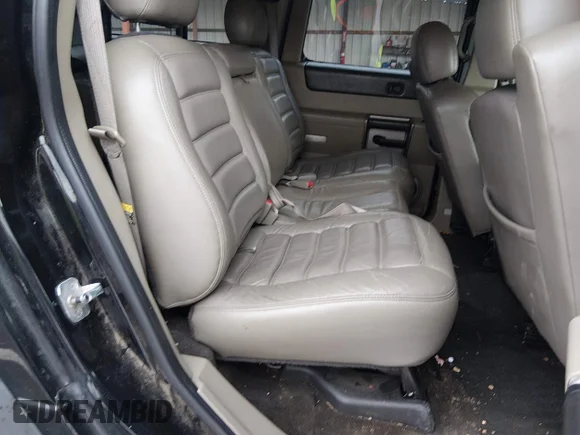 ✅ 2003 Hummer H2 • VIN: 5GRGN23U63H122778 • Лот: 44446573. Опубліковано раніше на IAAI з пробігом 163 796 миль. Безкоштовний доступ до архіву аукціонних продажів зі США та докладний звіт про історію автомобіля на DreamBid. Зображення 8.
