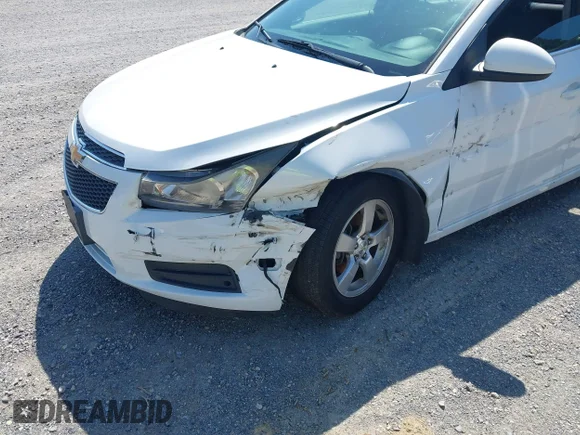 ✅ 2014 Chevrolet Cruze 1LT • VIN: 1G1PC5SBXE7429591 • Lot: 45423530. Wystawiony na IAAI z przebiegiem 97 616 mil. Bezpłatny archiwum sprzedaży aukcyjnych z USA i szczegółowy raport historii pojazdu na DreamBid. Zdjęcie 6.