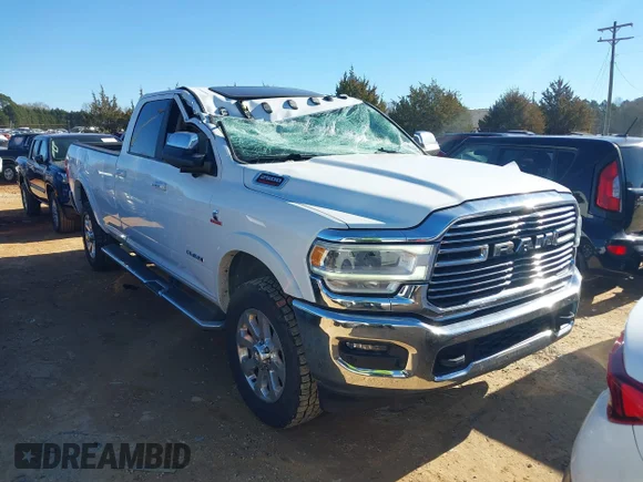 ✅ 2019 Ram 2500 Laramie • VIN: 3C6UR5KLXKG584862 • Лот: 41365787. Опубліковано раніше на IAAI з пробігом 128 986 миль. Безкоштовний доступ до архіву аукціонних продажів зі США та докладний звіт про історію автомобіля на DreamBid. Зображення 1.