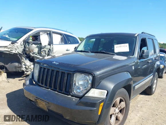 ✅ 2011 Jeep Liberty Sport • VIN: 1J4PN2GK7BW527403 • Lot: 43307524. Listed on IAAI with 98,152 mi. Free auction sales archive from the USA and detailed vehicle history report at DreamBid. Image 2.